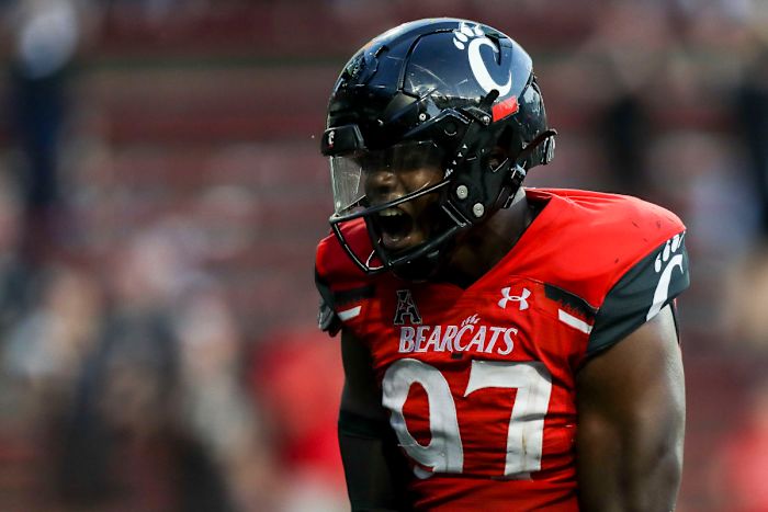 Sep 24, 2022; Cincinnati, Ohio, USA; Cincinnati Bearcats defensive lineman Eric Phillips (97) reacts after sacking Indiana Hoosiers quarterback Connor Bazelak (not pictured) in the second half at Nippert Stadium. Mandatory Credit: Katie Stratman-USA TODAY Sports